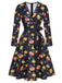 Robe noire à col en V et citrouilles d'Halloween