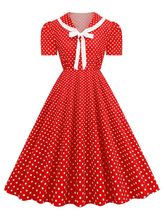 Robe trapèze à revers et nœud papillon à pois des années 1950