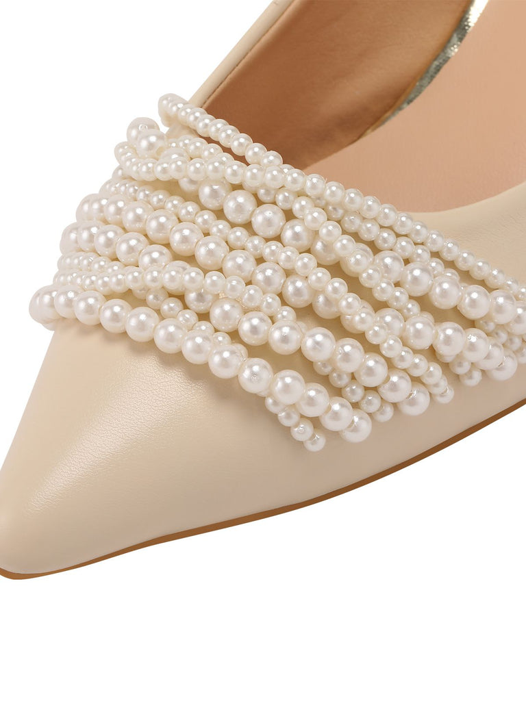 Chaussures à talons hauts pointues en cuir et perles avec perles